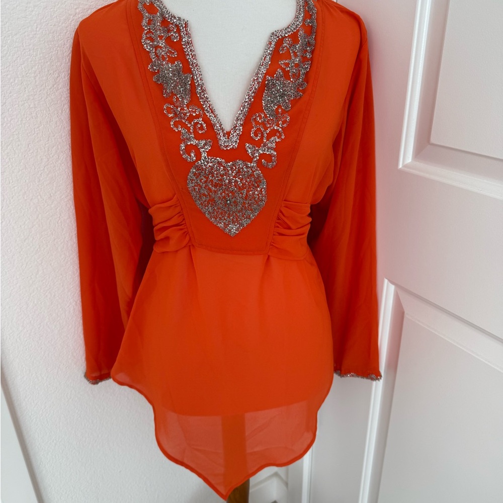 Chic Orange Blouse with Silver Detailing